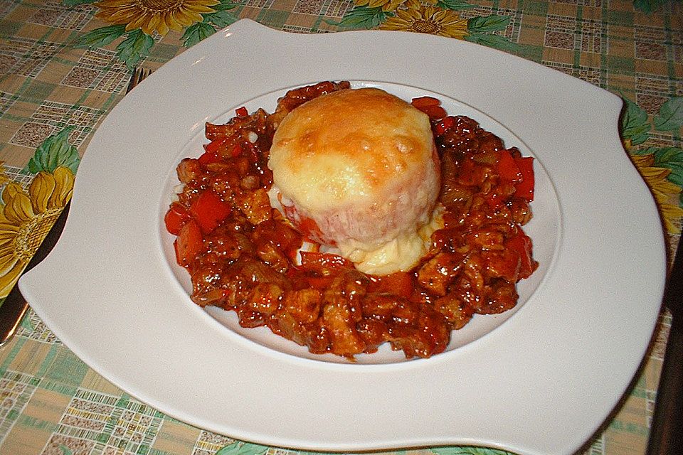 Gefüllte Tomaten mit Käsehaube