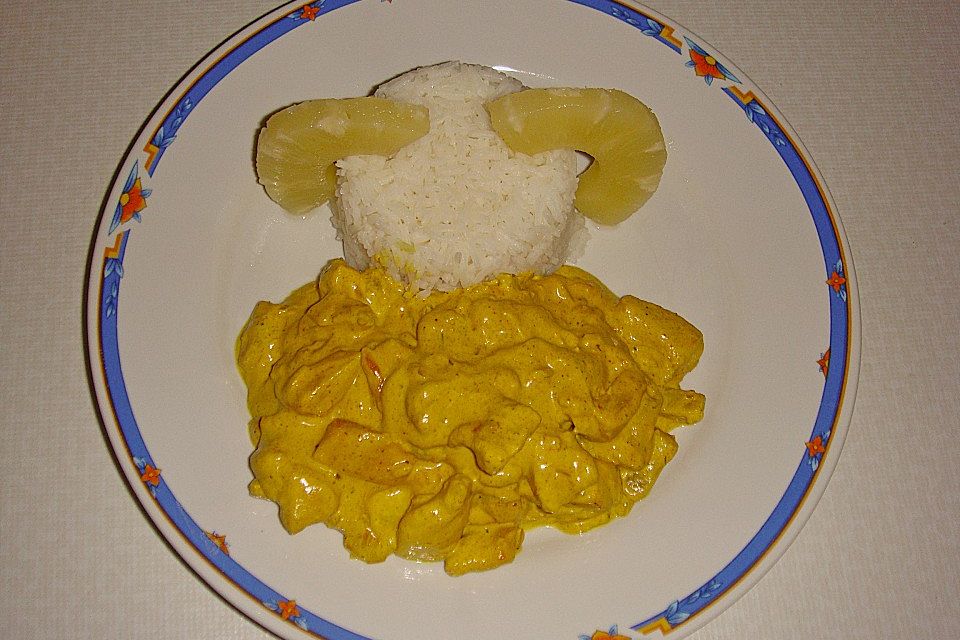 Geflügelcurry mit Reis