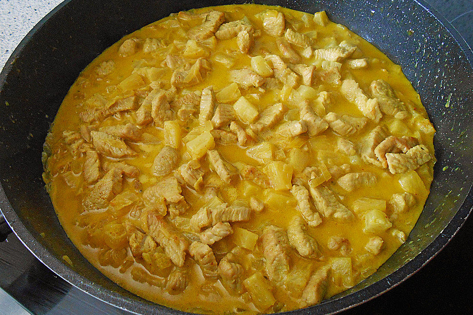 Geflügelcurry mit Reis