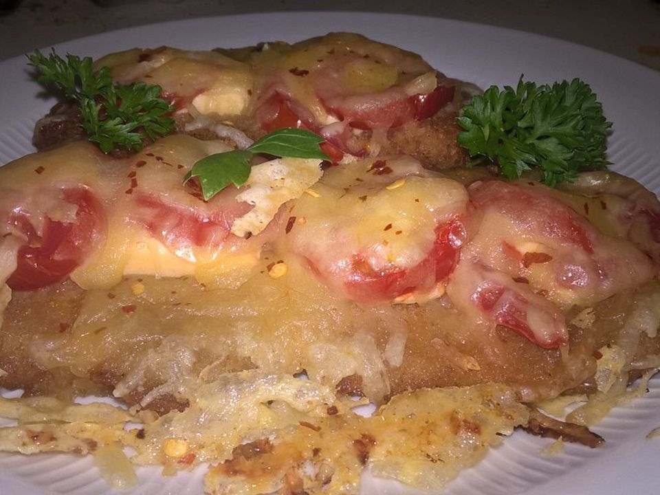 Überbackenes Schnitzel mit Schmelzkäse und Tomaten von MichaK | Chefkoch