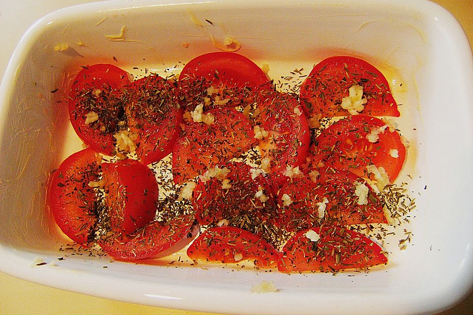 Limettenlachs auf Tomaten - Knoblauch - Bett