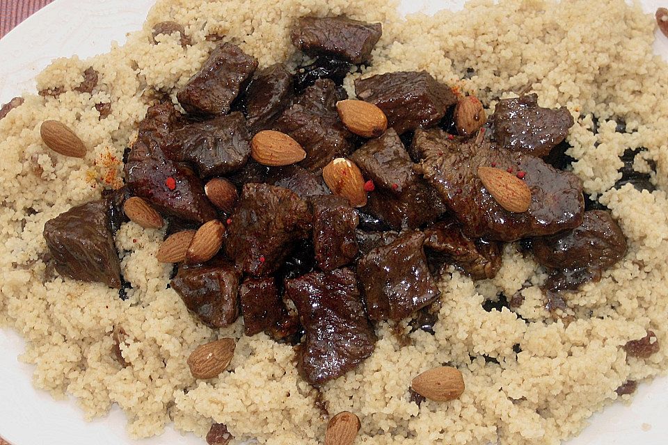 Rindfleisch - Tajine mit Mandeln und Backpflaumen Rindfleisch - Tajine mit Mandeln und Backpflaumen