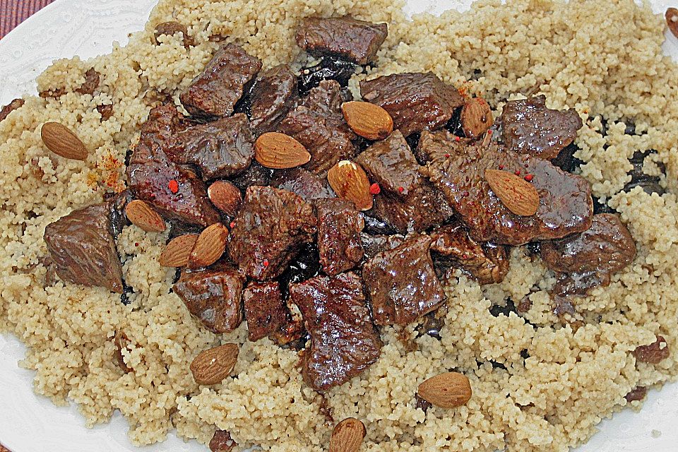 Rindfleisch - Tajine mit Mandeln und Backpflaumen Rindfleisch - Tajine mit Mandeln und Backpflaumen