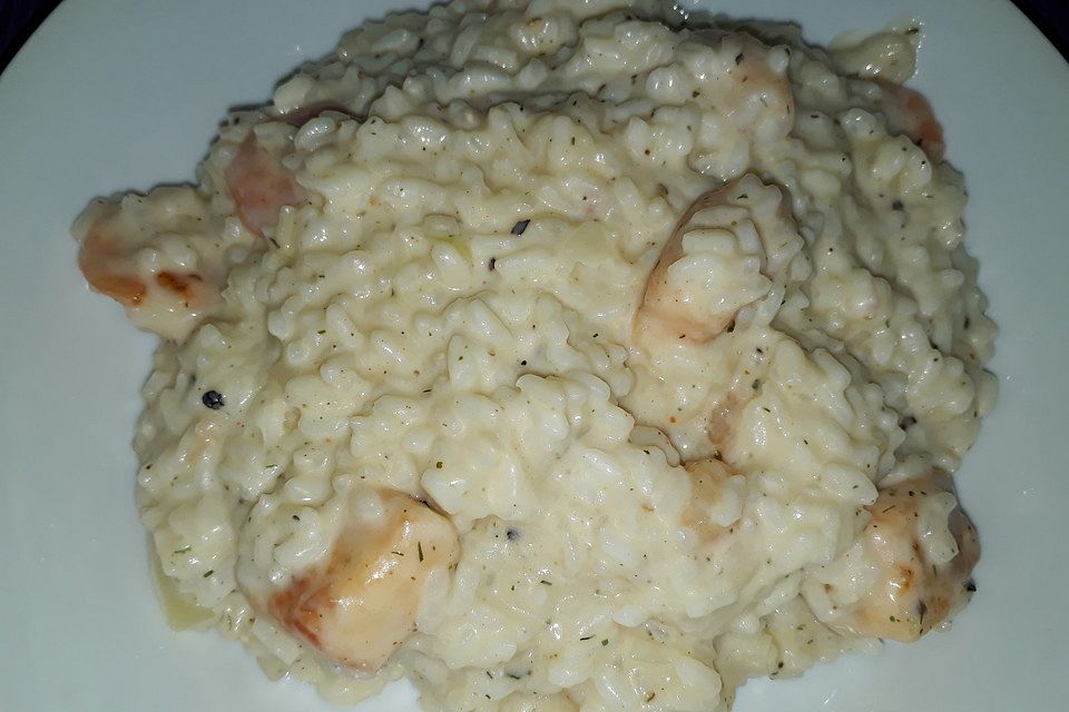 Risotto mit Garnelen, Lachs und Sahne