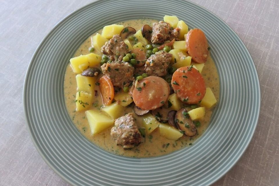 Albóndigas con Champignones y Guisantes