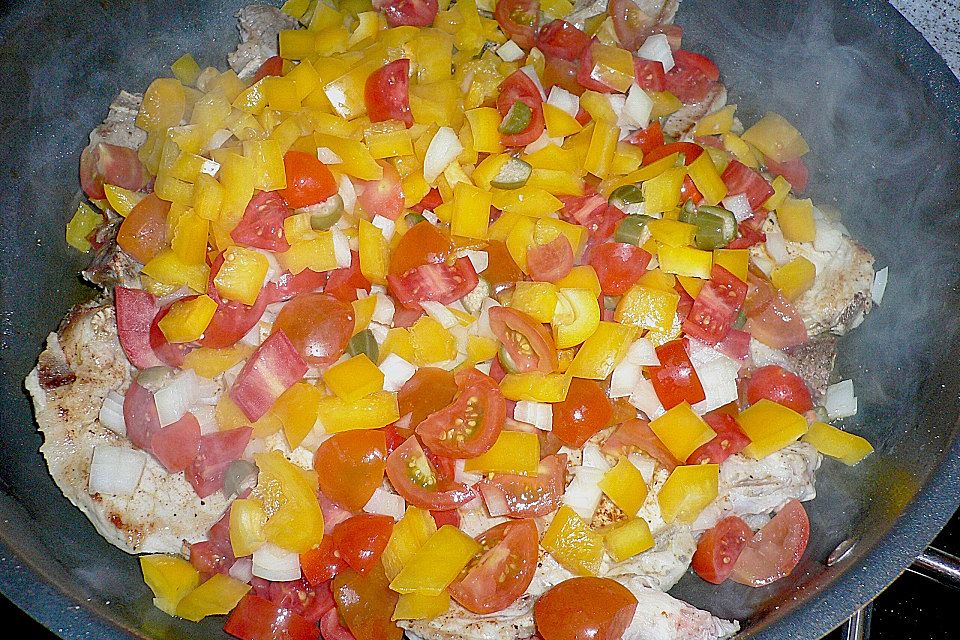 Geschmorte Koteletts alla pizzaiola mit Polenta Geschmorte Koteletts alla pizzaiola mit Polenta