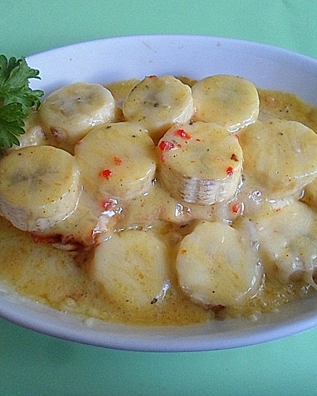 Puten - Schnitzel mit Banane in leckerer Curry - Sahne - Soße