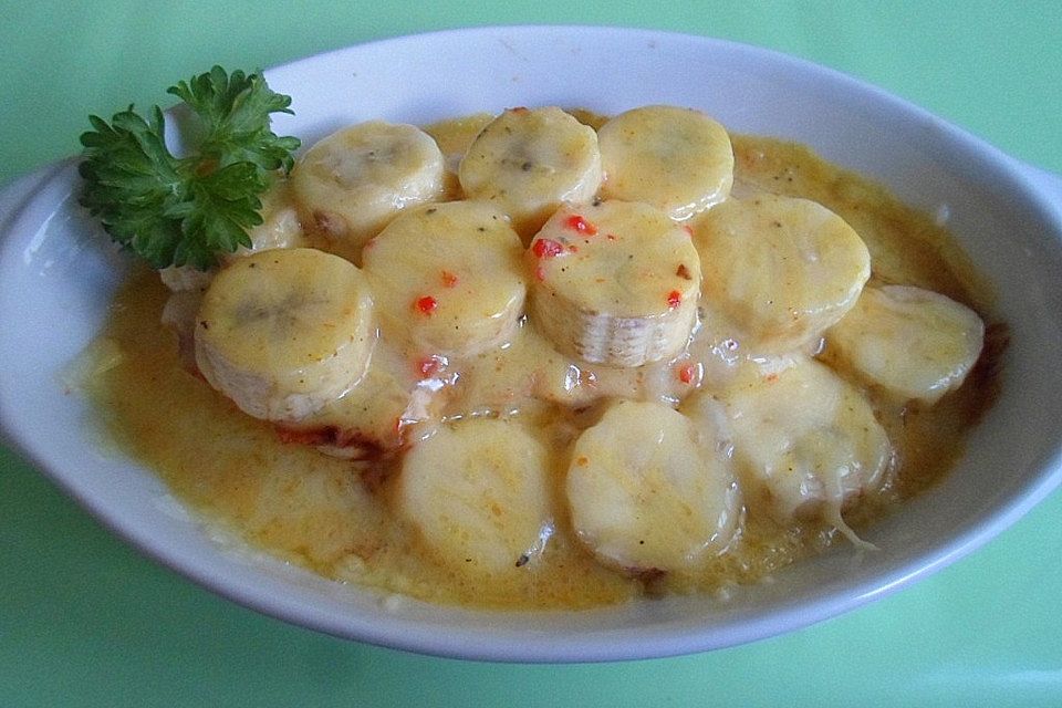 Puten - Schnitzel mit Banane in leckerer Curry - Sahne - Soße