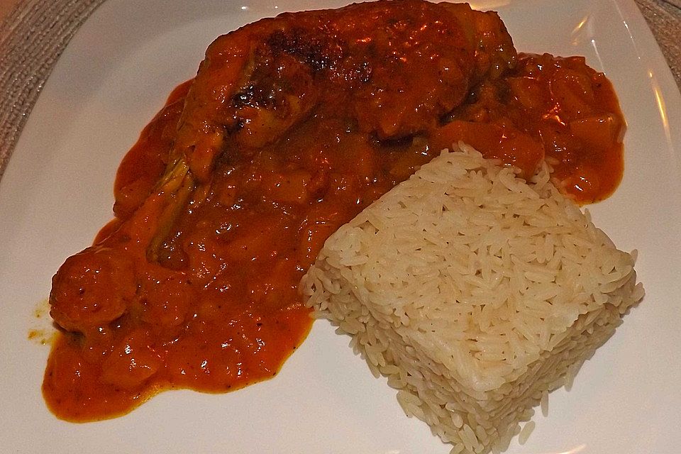 Hähnchenkeulen mit Curry-Apfelsoße