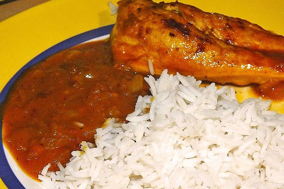 Hähnchenkeulen mit Curry-Apfelsoße