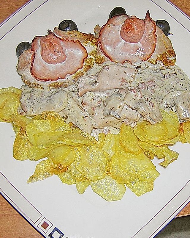 Schweinerückenmuscheln mit Champignonsauce und Kartoffelchips