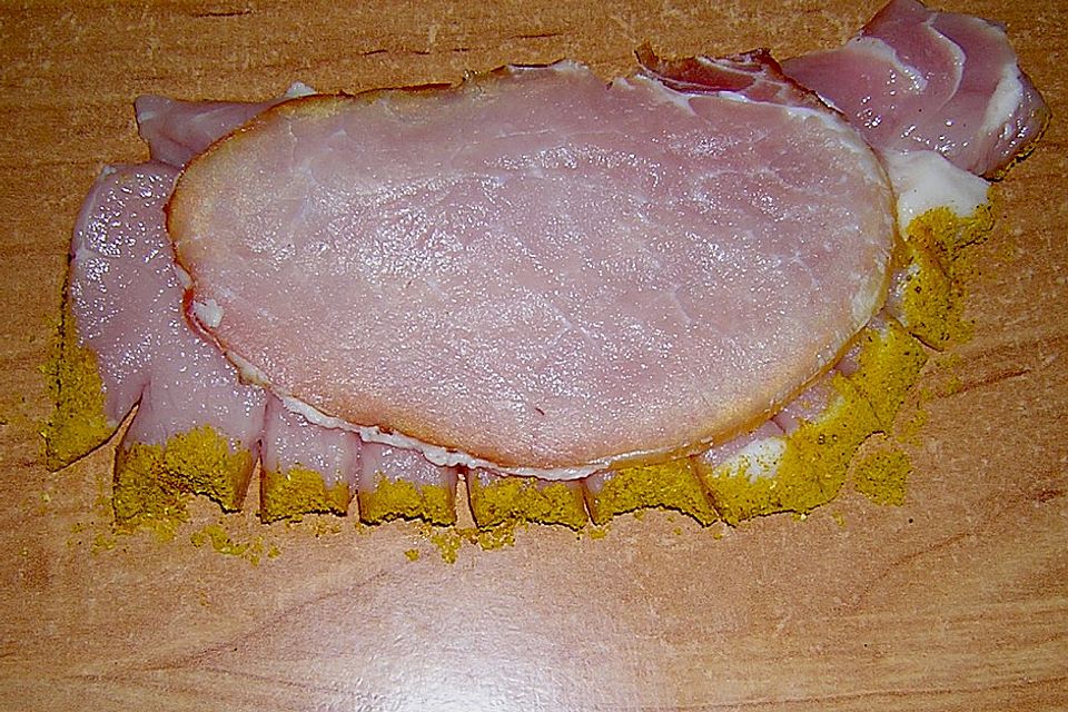 Schweinerückenmuscheln mit Champignonsauce und Kartoffelchips Schweinerückenmuscheln mit Champignonsauce und Kartoffelchips