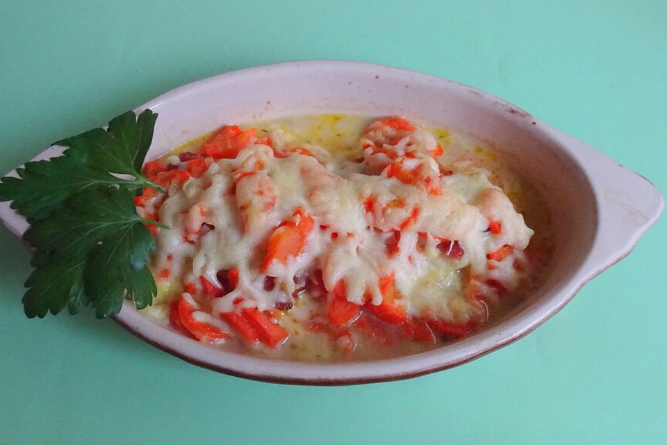 Putenschnitzel in Karotten - Zwiebelsoße überbacken