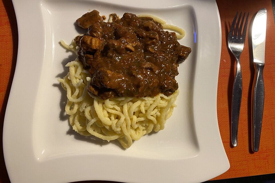 Kalbsragout mit Steinpilzen und Kräutern