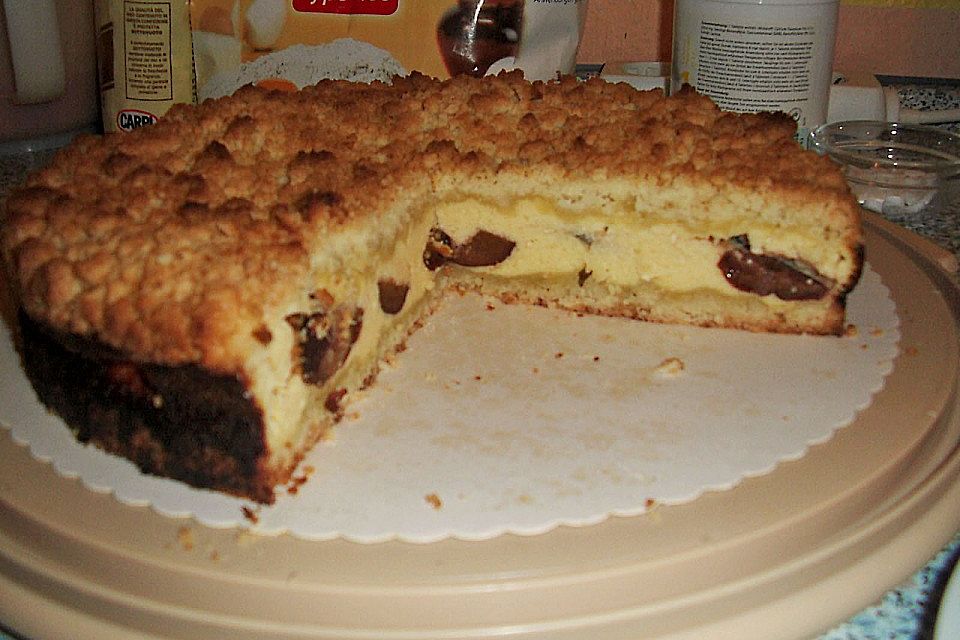 Saftiger Käsekuchen mit Aprikosen und Streuseln