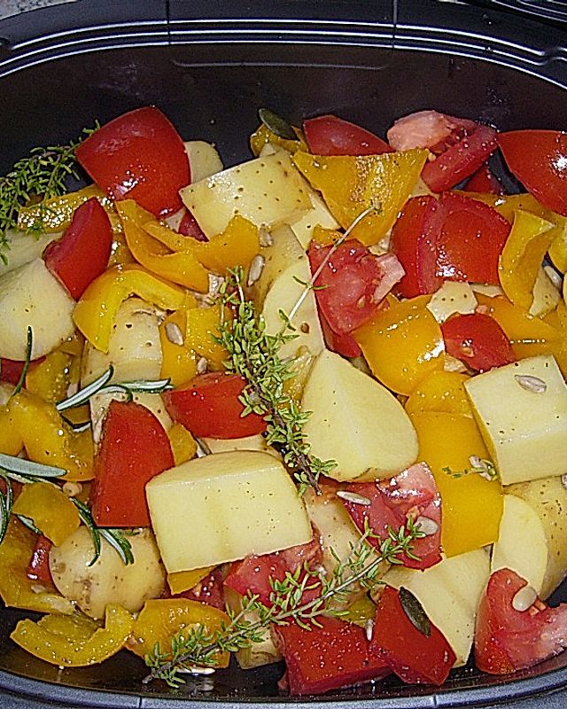 Kartoffeln mit Paprika und Tomaten