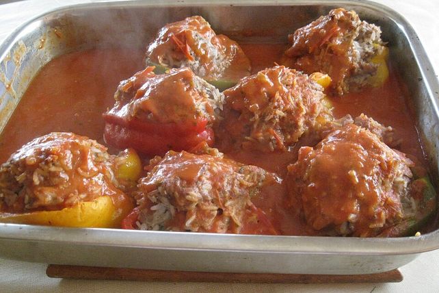 Paprikaschoten mit Hackfleischfüllung und Reis| Chefkoch