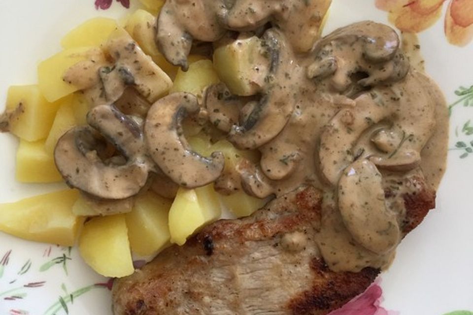 Kalbsschnitzel mit Champignon - Zitronensauce