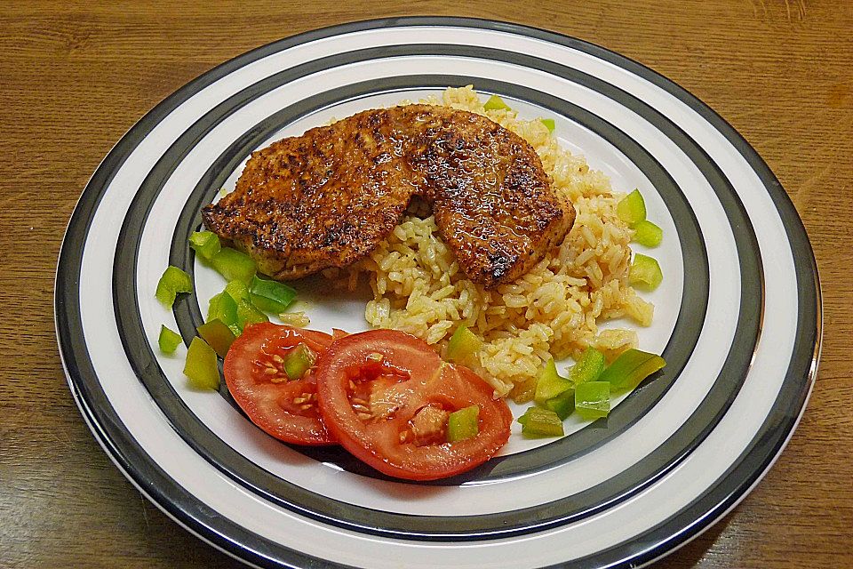 Naturschnitzel à la minute mit buntem Gemüse und Reis