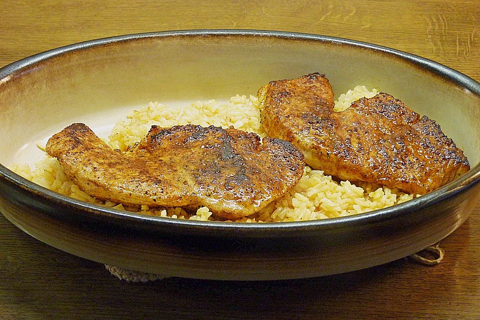 Naturschnitzel à la minute mit buntem Gemüse und Reis