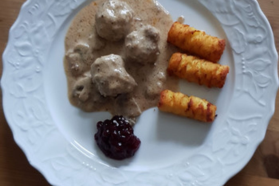 Köttbullar mit Champignon-Rahmsauce