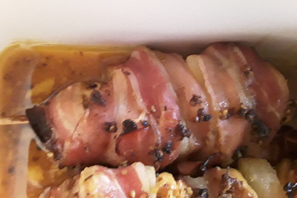 Hähnchen - Ananas - Spießchen mit Bacon und Curryreis