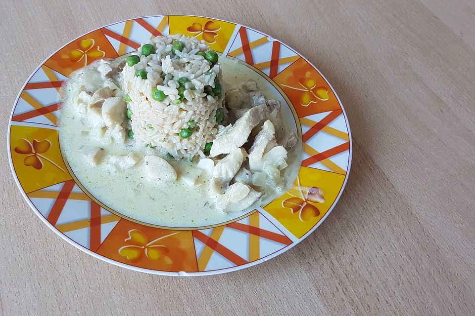 Rotbarschfilet in Sahne-Senfsauce mit Erbsenreis