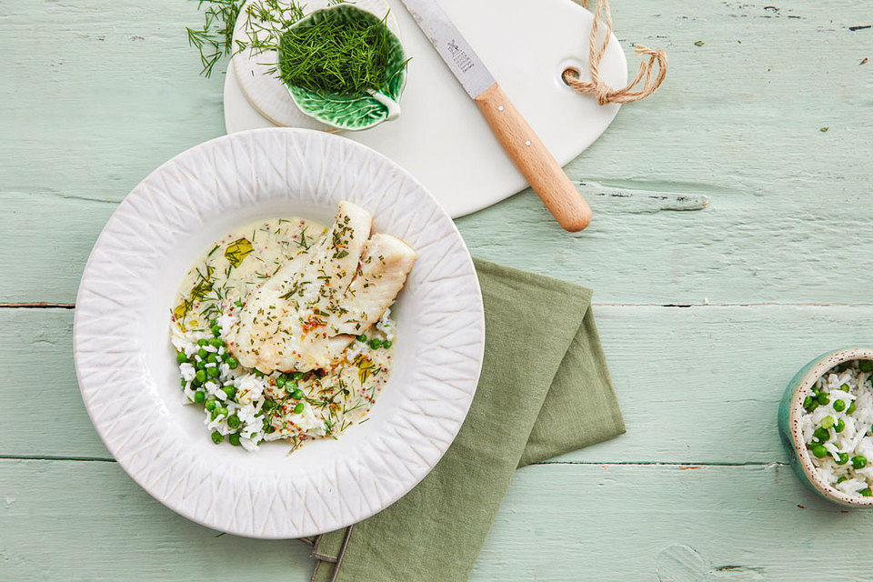 Rotbarschfilet in Sahne-Senfsauce mit Erbsenreis