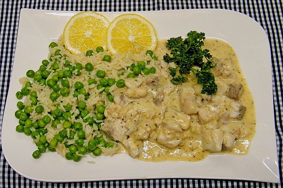 Rotbarschfilet in Sahne-Senfsauce mit Erbsenreis