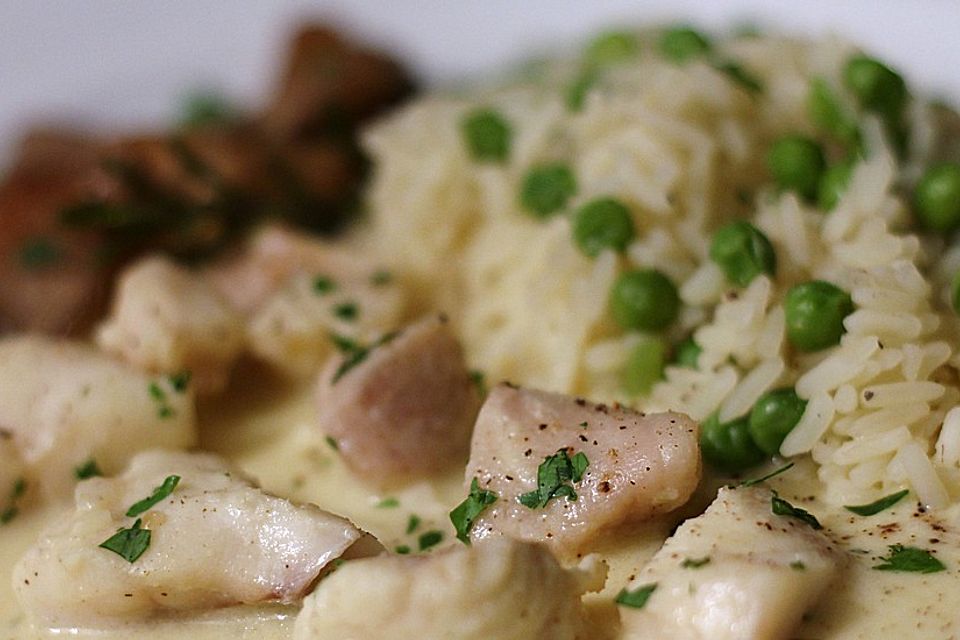 Rotbarschfilet in Sahne-Senfsauce mit Erbsenreis