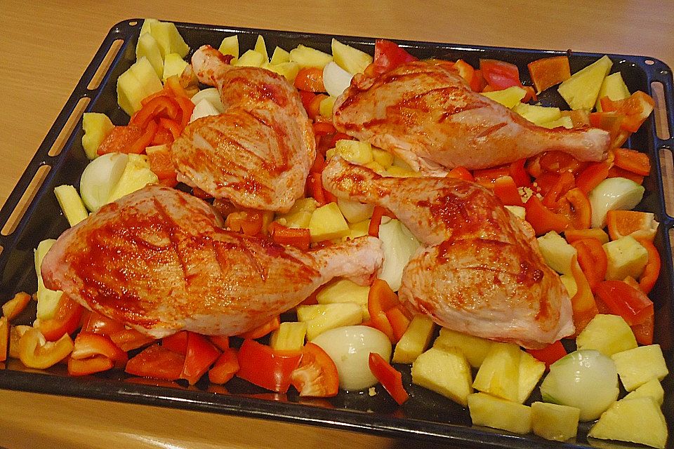 Hähnchenkeulen auf Paprika und Ananas