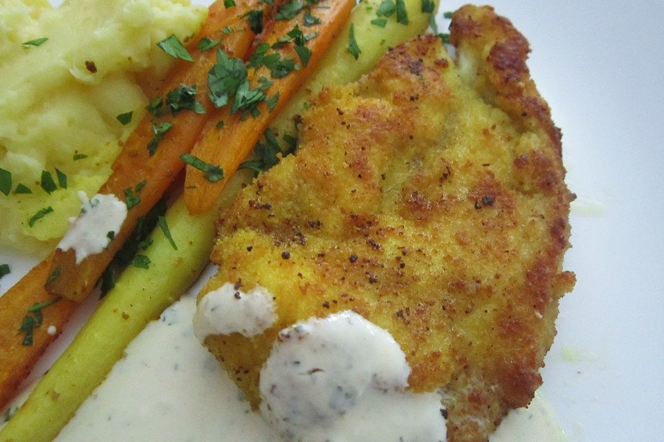 Paniertes Schnitzel mit Frischkäse - Sahne Sauce