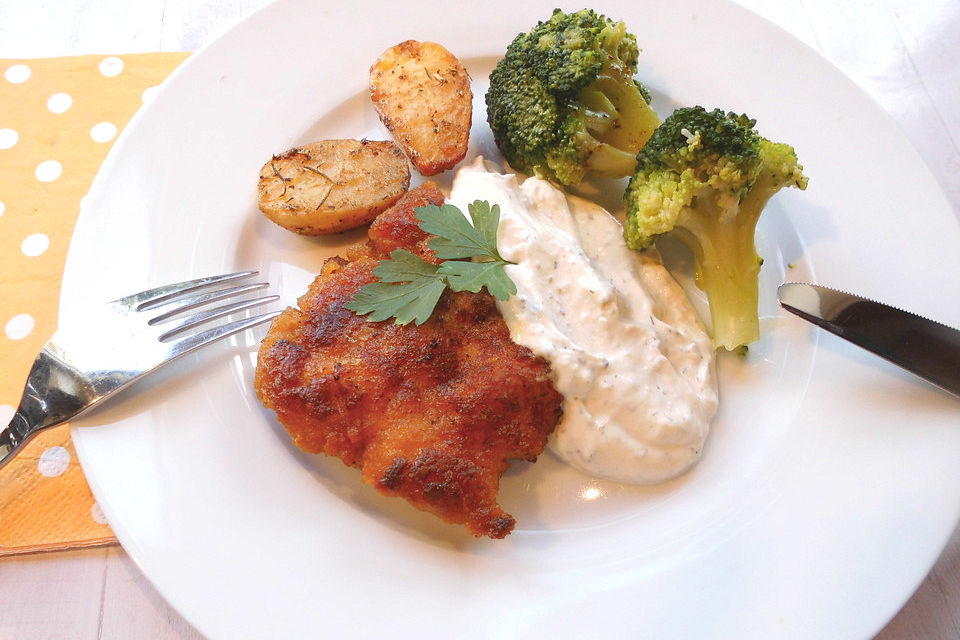 Paniertes Schnitzel mit Frischkäse - Sahne Sauce