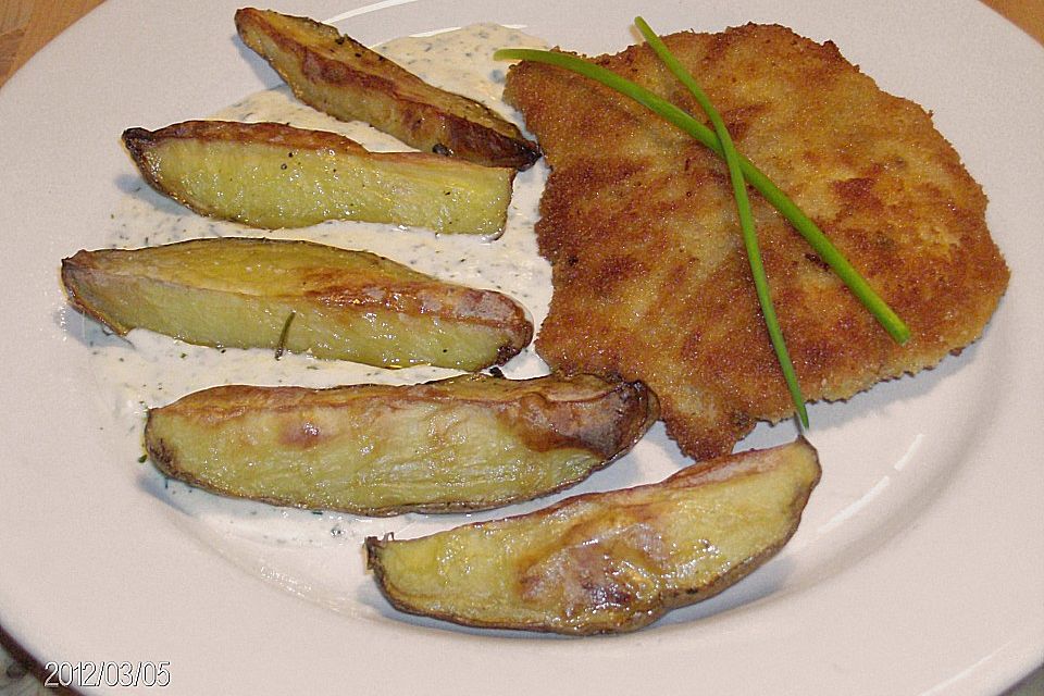 Paniertes Schnitzel mit Frischkäse - Sahne Sauce