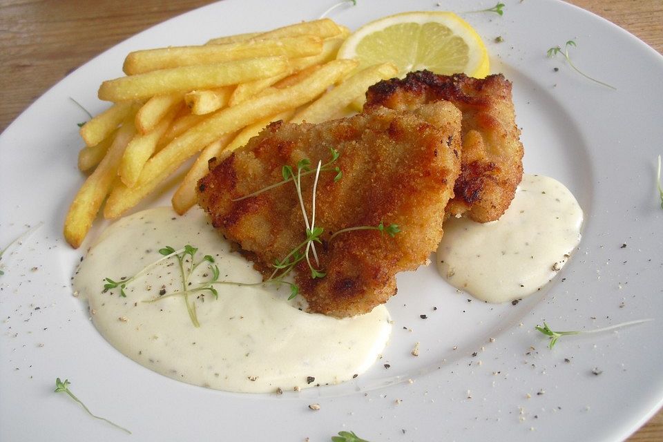 Paniertes Schnitzel mit Frischkäse - Sahne Sauce