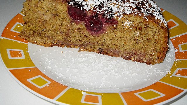 festlicher schoko nuss kuchen mit kirschen