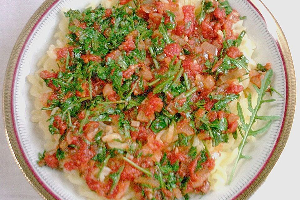 Nudeln mit Rucola und Tomaten