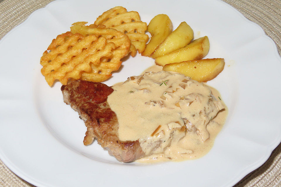 Schweinekoteletts mit Apfel - Calvados - Creme