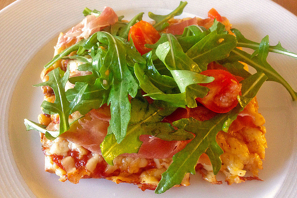 Rucola-Pizza mit Parmaschinken