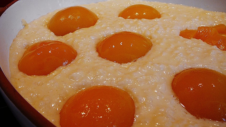 Milchreis mit Pfirsichen und "Schneedecke" von ZwergTomate Milchreis mit Pfirsichen und "Schneedecke" von ZwergTomate