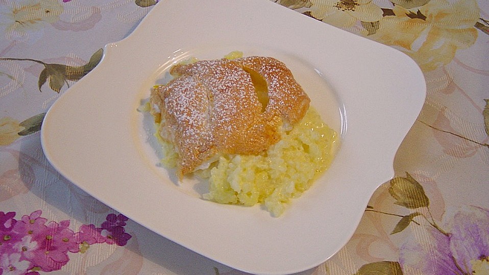 Milchreis mit Pfirsichen und "Schneedecke" von ZwergTomate Milchreis mit Pfirsichen und "Schneedecke" von ZwergTomate