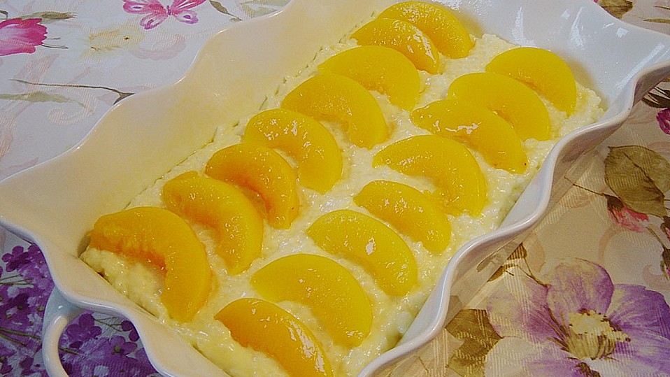 Milchreis mit Pfirsichen und "Schneedecke" von ZwergTomate Milchreis mit Pfirsichen und "Schneedecke" von ZwergTomate