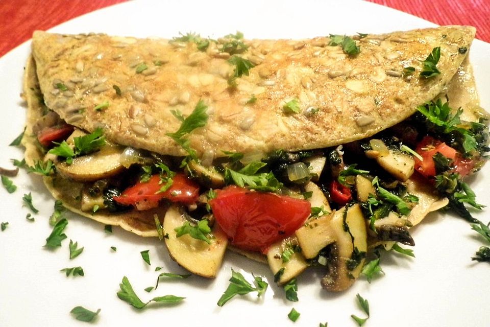 Vegetarischer Pfannkuchen mit Spinat-Champignon-Füllung