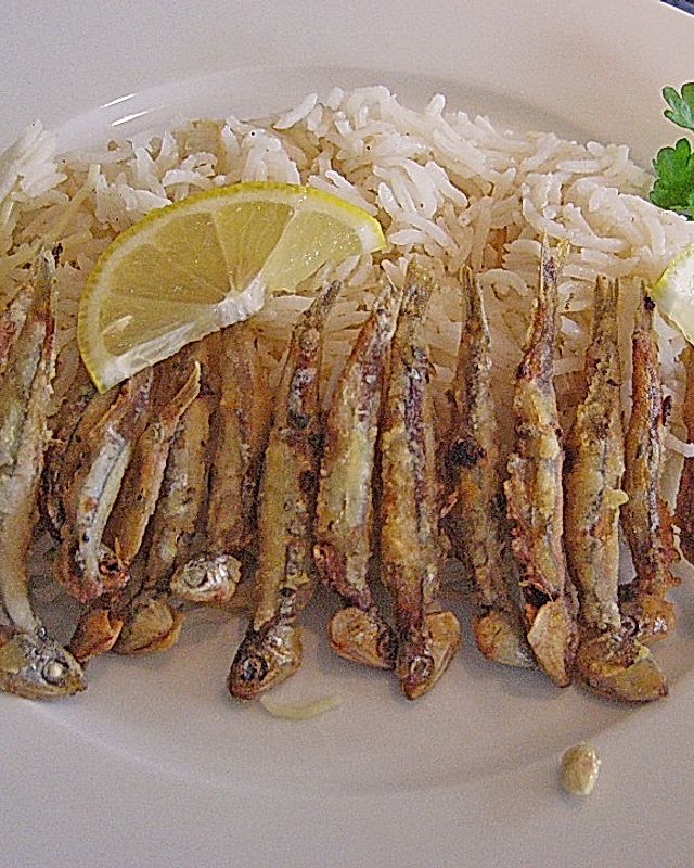 Anchovis mit Reis und Salat