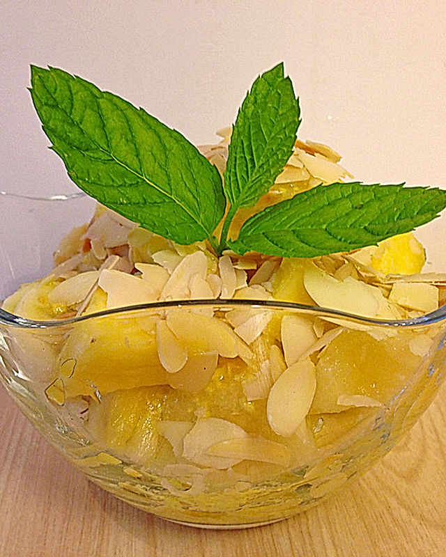 Fruchtsalat in gelb mit Ingwer