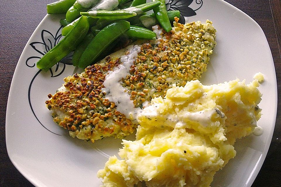 Pangasius mit Mandelkruste auf Zuckerschoten