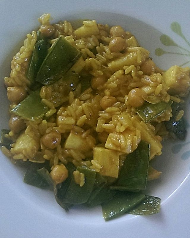 Curry-Reis mit Zuckerschoten und Kichererbsen