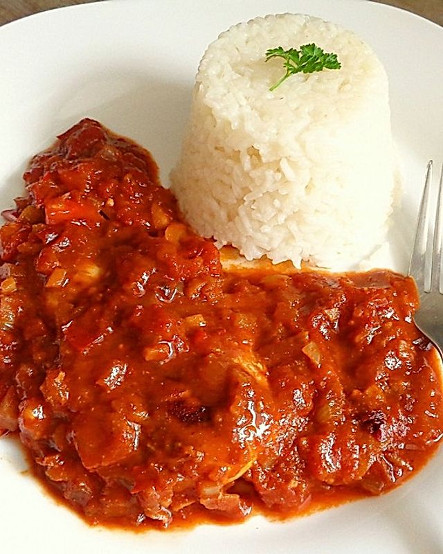 Pouletschnitzel in Curry-Tomatensauce