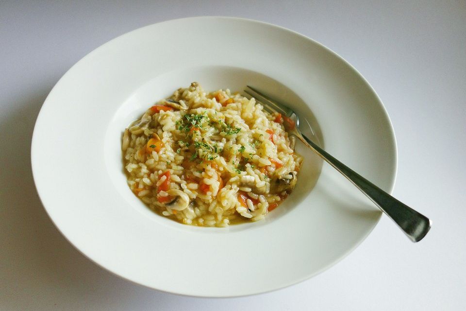 Risotto mit Champignons und Tomaten