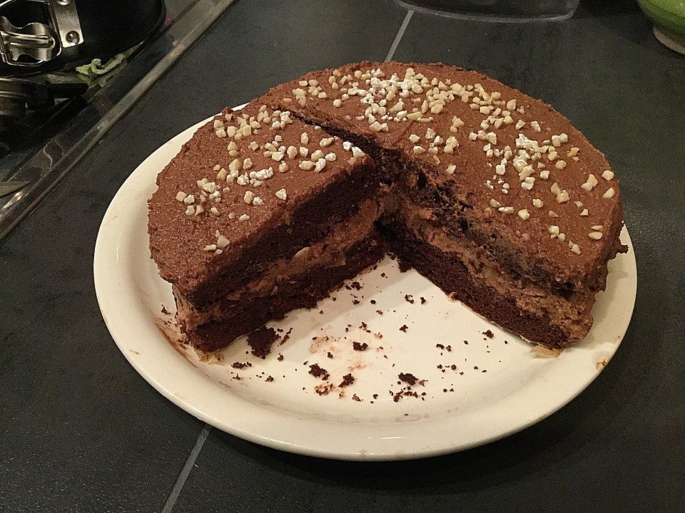 Nutellakuchen mit Nougat-Sahnefüllung von Backmouse | Chefkoch